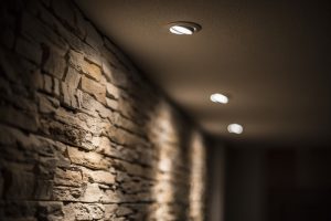 brick-wall-with-recessed-lighting-shining-on-it